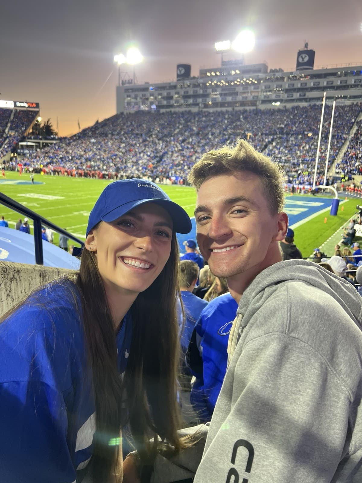 Calvin and his wife at a BYU football game